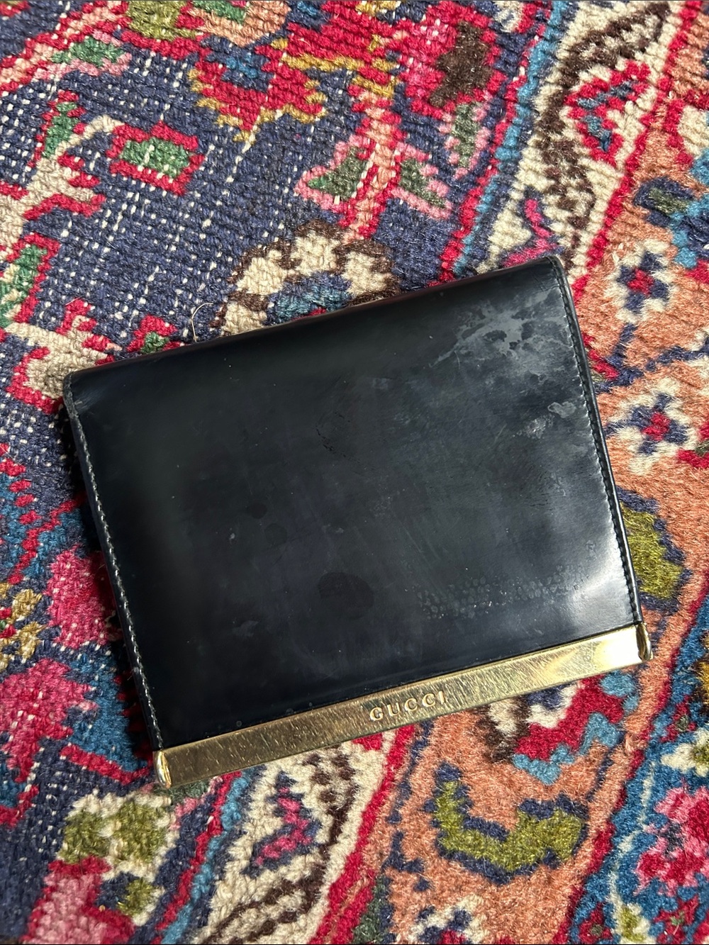 Gucci Black Leather wallet with Gold-Tone Trim great condition